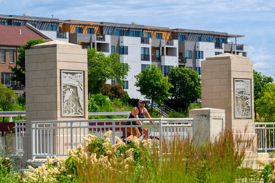 City of Mishawaka resident riding bike in park.
